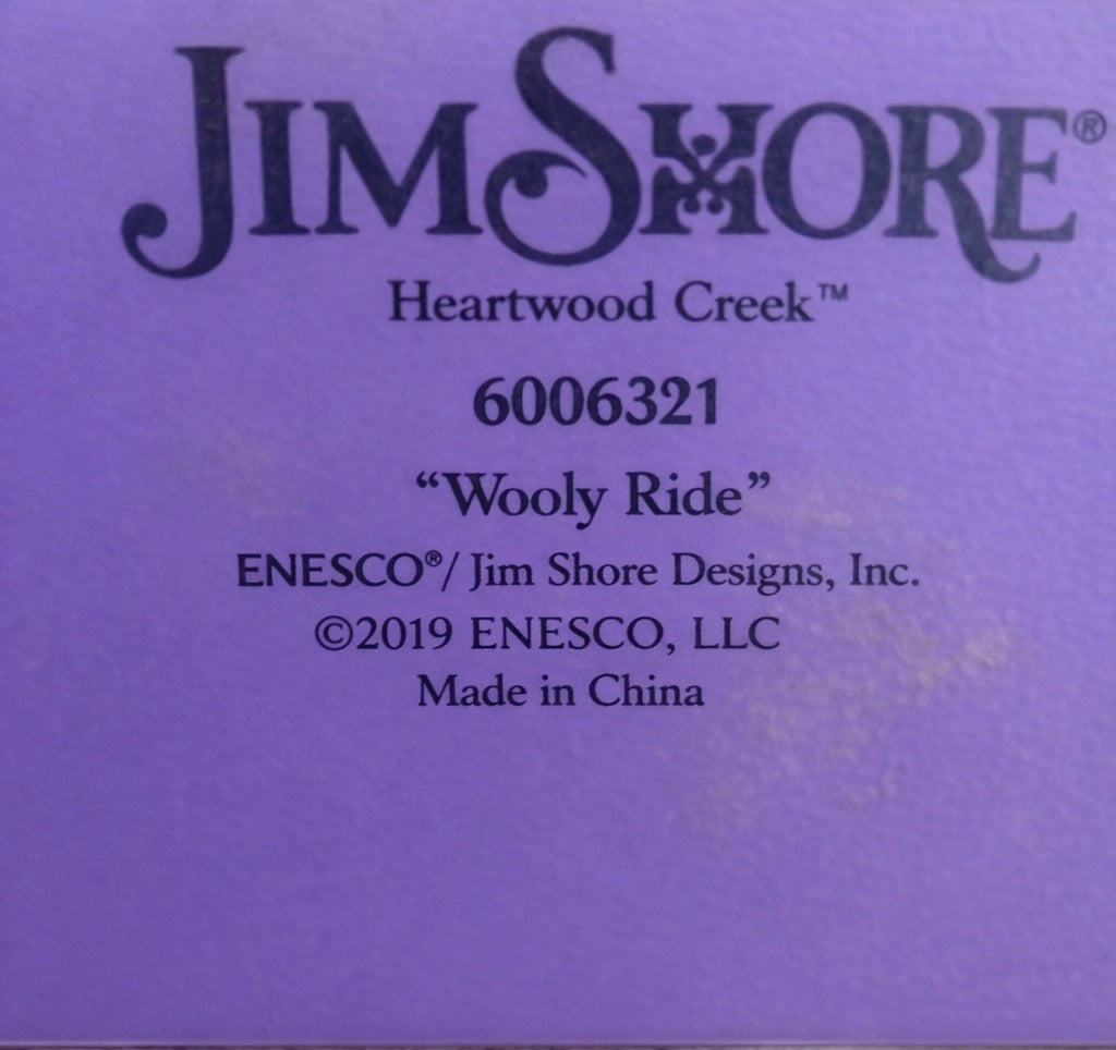 Hand- Carved Folk Art Sheep on Rolling Base